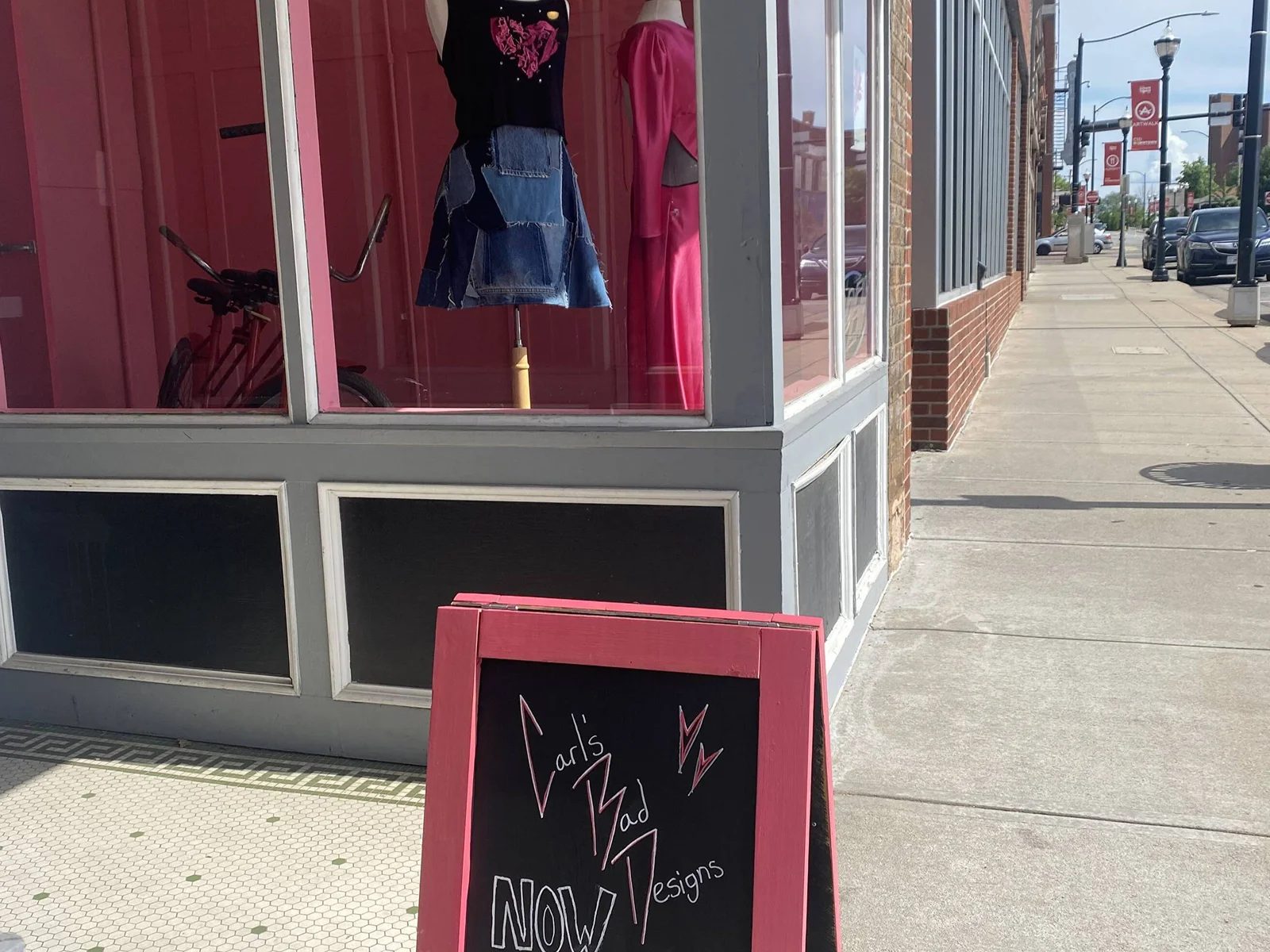 The 314 S Campbell storefront and display window from the sidewalk